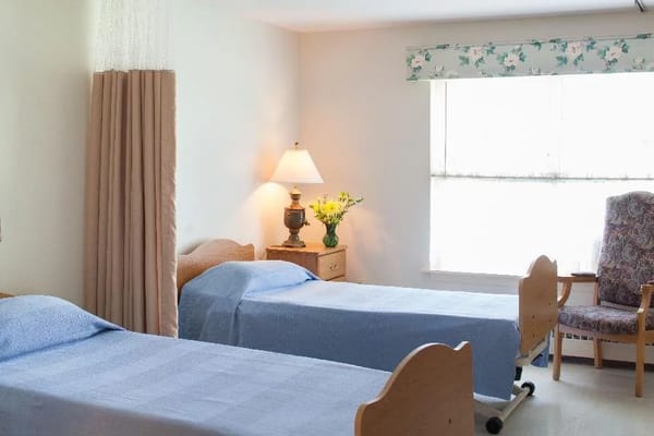 A two-bed resident room with natural light