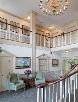 Bright interior of a facility lobby with seating