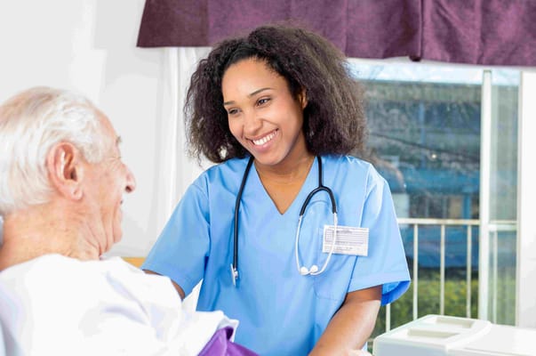 Nurse interacting with a senior resident in a care facility