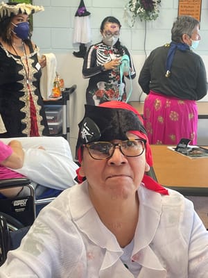 Residents participating in a festive dress-up activity