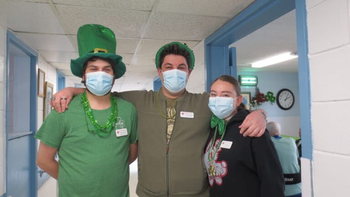 Staff celebrating with themed attire and decorations