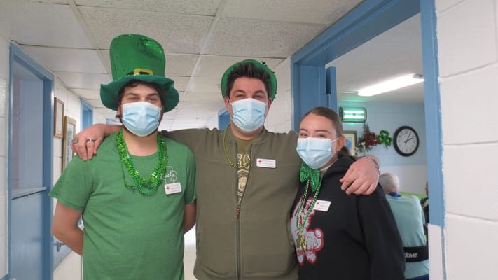 Staff celebrating with themed attire and decorations