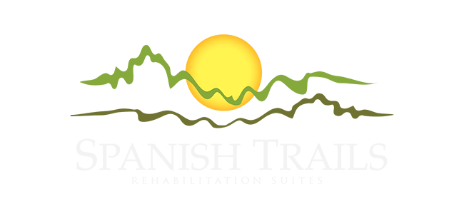 A logo featuring a sun and green hills