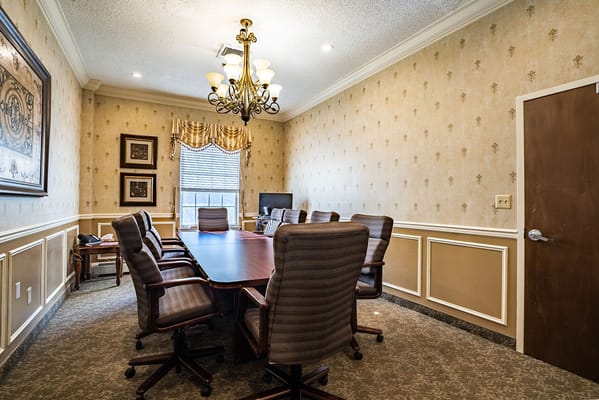 Conference room with a large table and chairs