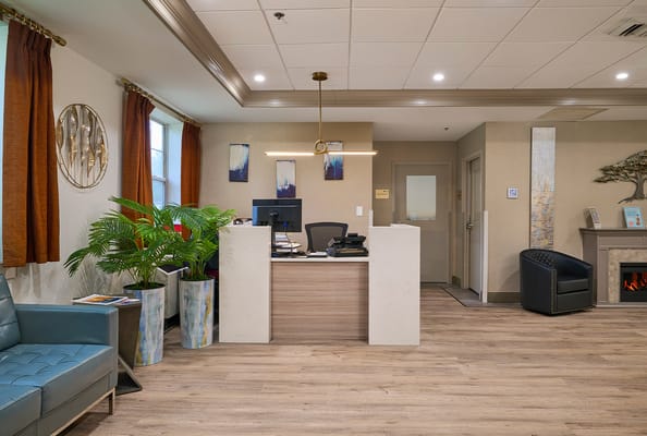 Bright reception area with seating and decor