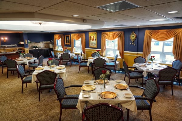 Elegant dining room with neatly set tables