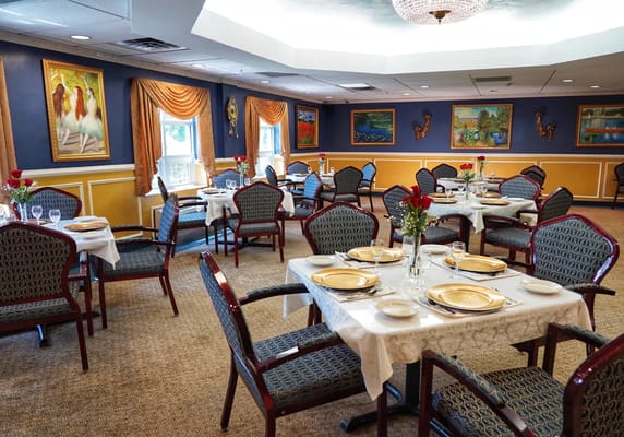 Elegant dining area set for meals with decorations