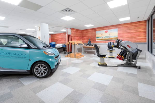 Rehabilitation room with exercise equipment and facility transport