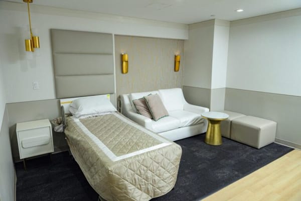 Comfortable resident room with seating and decor