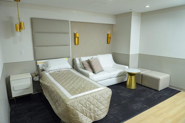 Comfortable resident room with seating and decor