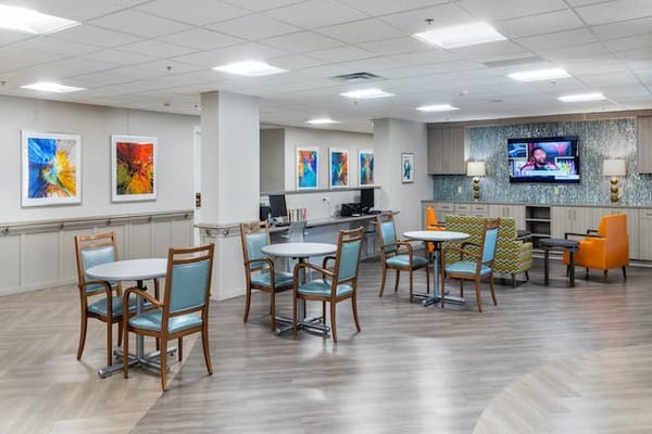 Bright common area with seating and artwork