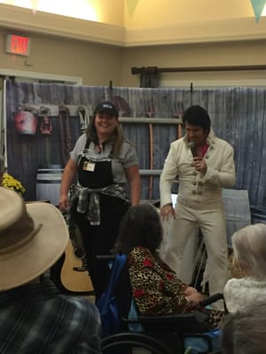 Residents enjoying a performance in a common area