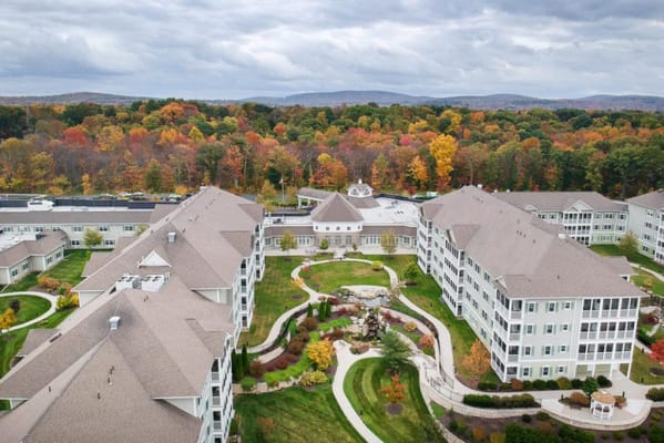 Aerial view of a senior living community with gardens