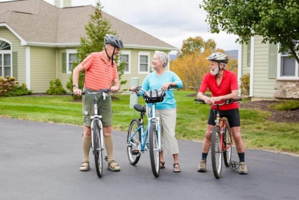 Residents enjoying a bike ride outside the facility