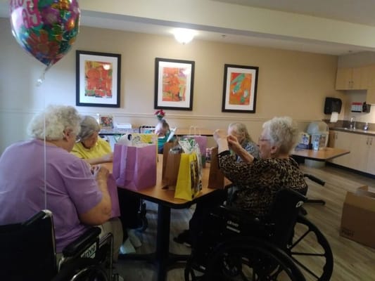 Residents engaged in an arts and crafts activity indoors