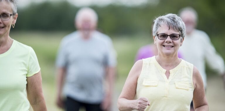 Residents participating in an outdoor exercise activity