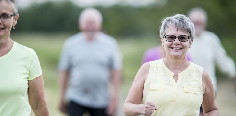 Residents participating in an outdoor exercise activity