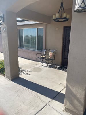 Seating area outside a residential doorway
