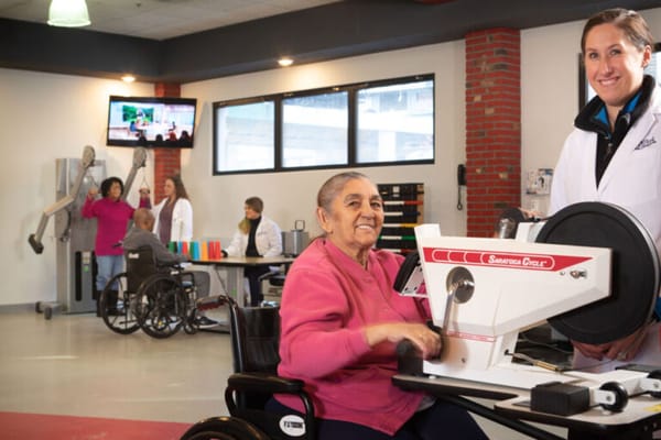 Residents participating in physical therapy activities