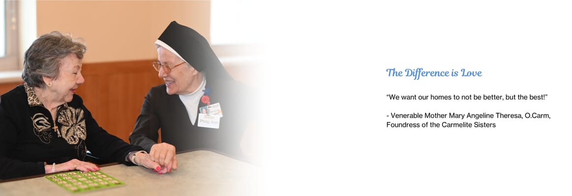 A resident engaged in conversation with a staff member