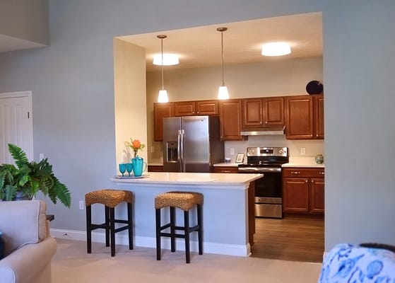 Modern kitchen with seating area and appliances