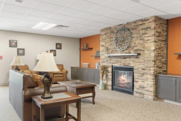 Cozy common area with a fireplace and seating