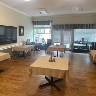 Dining area with tables prepared for meals