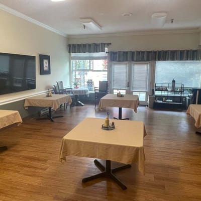 Dining area with tables prepared for meals
