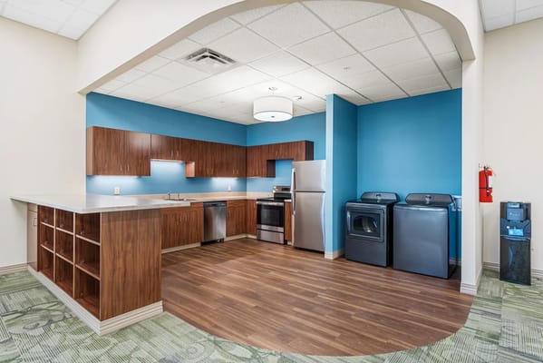 Bright kitchen area with modern appliances