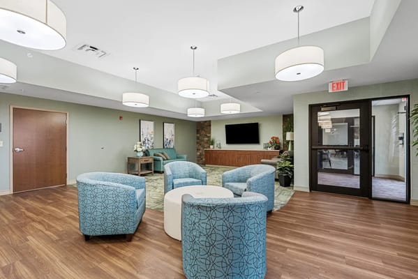 Bright common area with seating and decor
