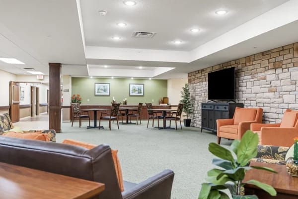 A spacious common area with seating and decor