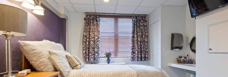 Private resident room with bed and window