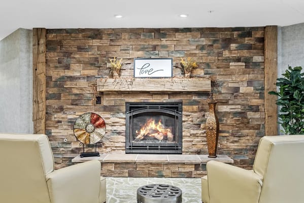 Cozy living area with a fireplace and seating