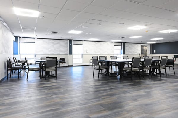 Bright dining room with tables and chairs