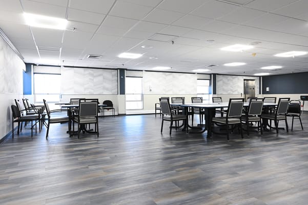 Bright dining room with tables and chairs