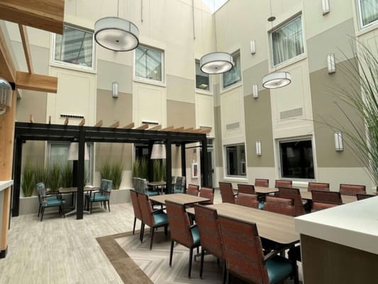 Interior common area with seating and natural light