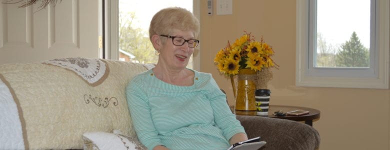 Resident enjoying a moment in a cozy living area