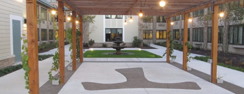 Outdoor courtyard area with a fountain and seating