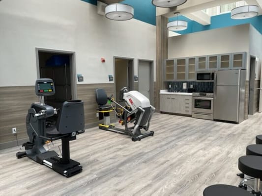 Interior view of physical therapy equipment in a spacious room