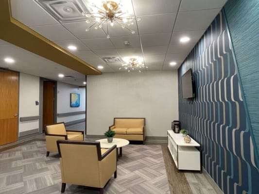 Bright common area with seating and decor