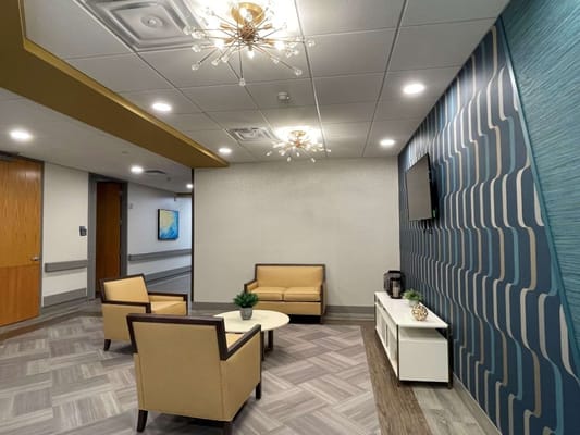 Bright common area with seating and decor