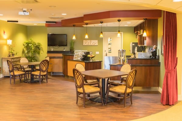 Interior common area with seating and refreshments