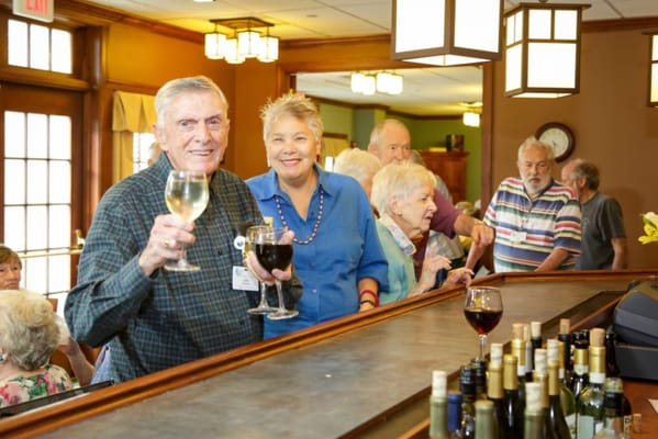 Residents enjoying a social activity at the bar