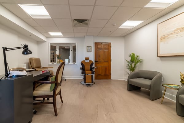 Bright interior space with seating and workspace areas