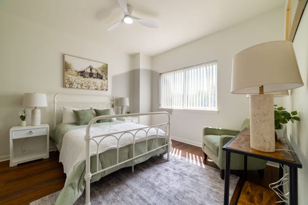 A cozy resident room with natural light