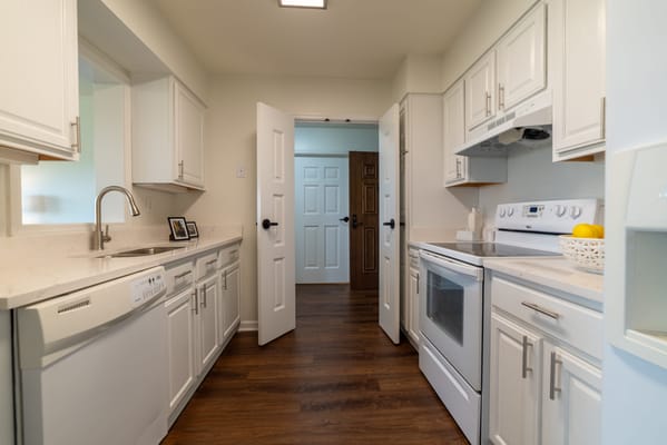 Bright kitchen area with modern appliances