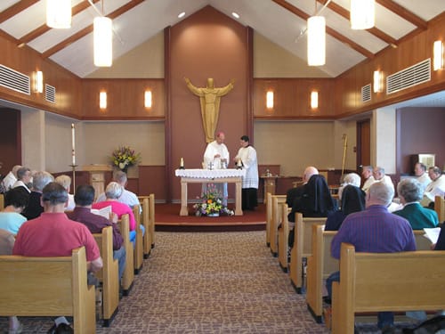 Residents attending a religious service in a chapel
