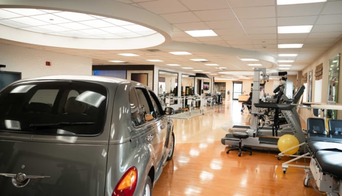 Interior view of a rehabilitation area with exercise equipment