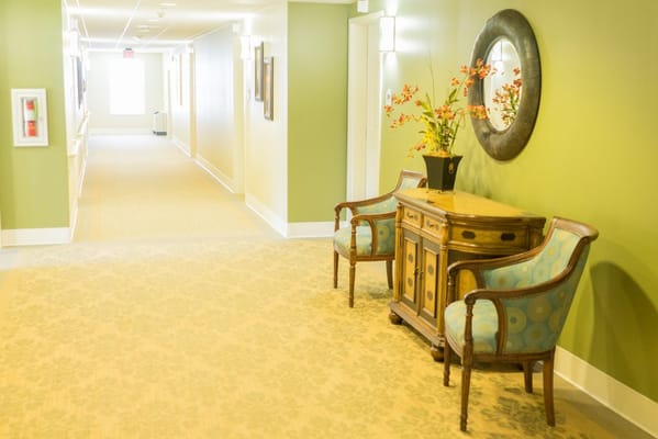 Bright hallway with comfortable seating and decorations