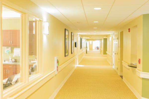 Light-filled hallway in a senior living facility